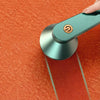 Electric Portable Lint Remover Green Lint Remover shaving orange cloth